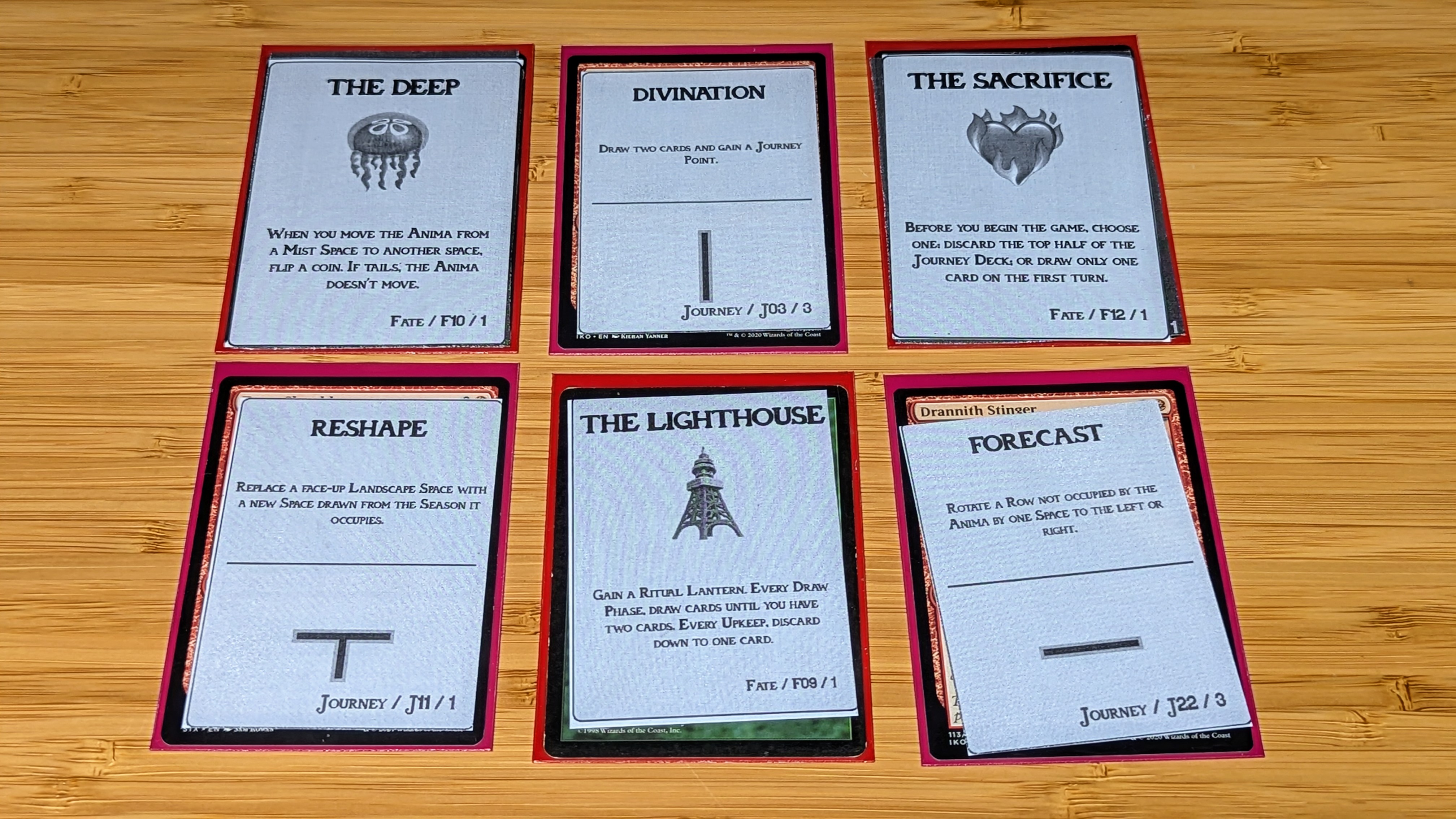 Photo of our newly printed CIDEr cards sleeved and ready to play.